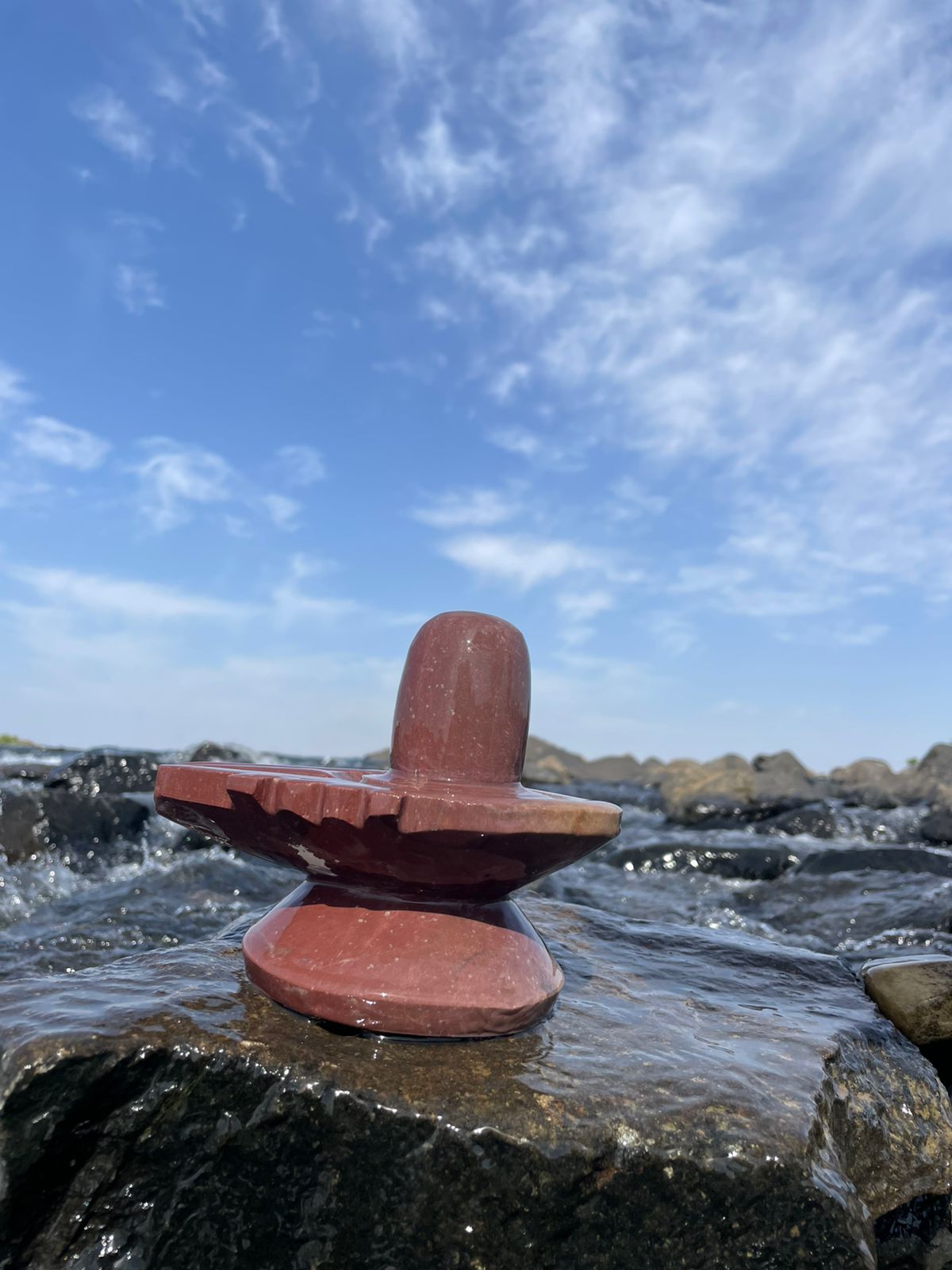 2.5 Inch Narmadeshwar Shivling with 5 Inch Red Stone Jaladhari