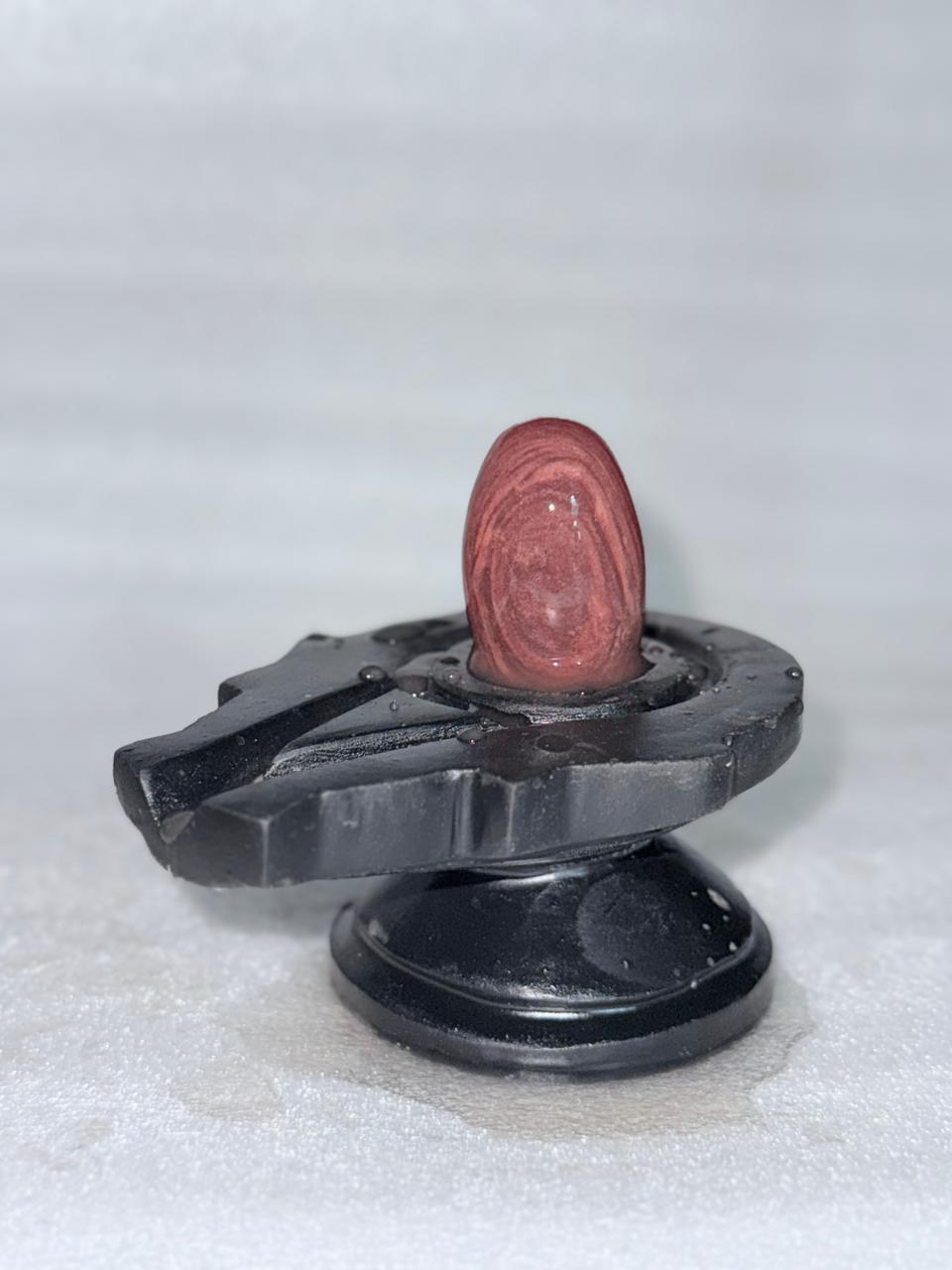 2” Designer Pink Oval Narmadeshwar Shivling with 4” Black Jaladhari Base – Natural Ring Pattern Finish